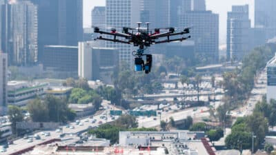 Drone flying over construction site in downtown Los Angeles.